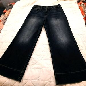High-waisted, wide leg jeans.
